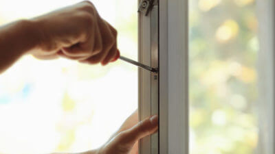 Does Your Sunroom Need Repair - Screwdriver in window frame